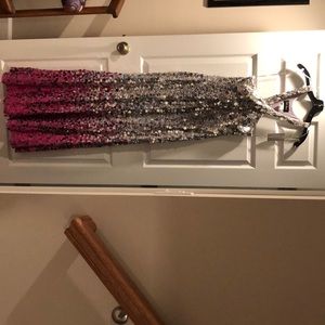 LaFemm Silver sequined gown. Size 6, NWT.